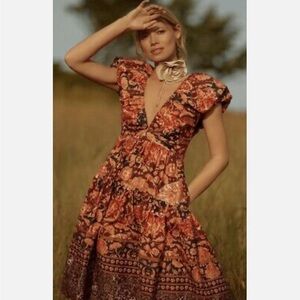 NWT Anthropologie- Vneck printed babydoll dress.Size 10.